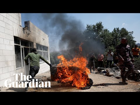 Armed Israeli settlers attack Palestinian town in revenge attack