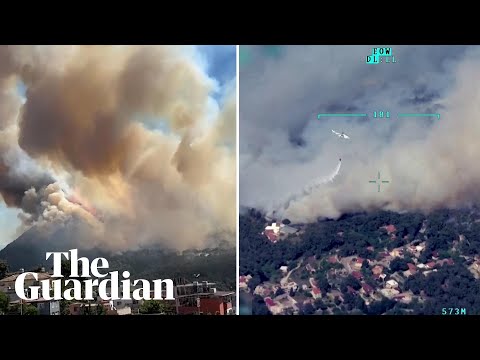 Turkey: helicopters drop water on raging wildfires threatening residential areas