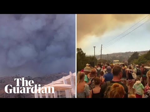 Thousands flee Greek island of Rhodes as wildfires threaten hotels