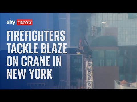 Watch live from New York, as firefighters tackle blaze on a crane