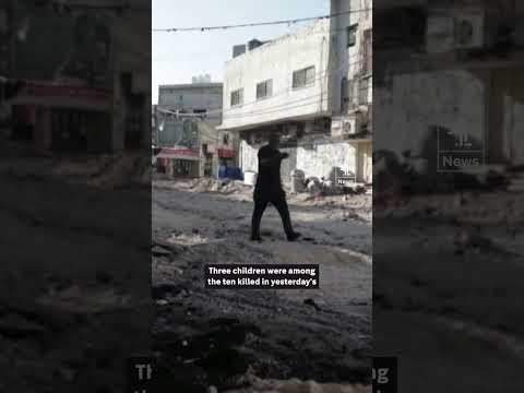 Emergency workers treat Jenin victims.