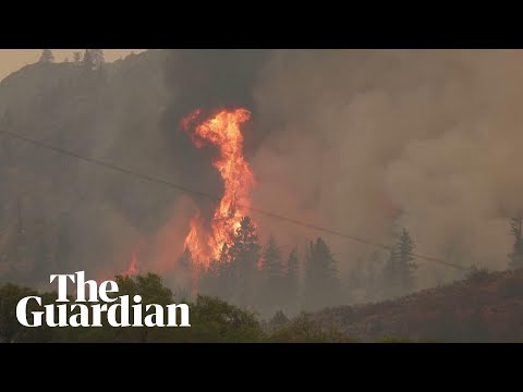 Wildfires cross US border into Canada triggering evacuation order