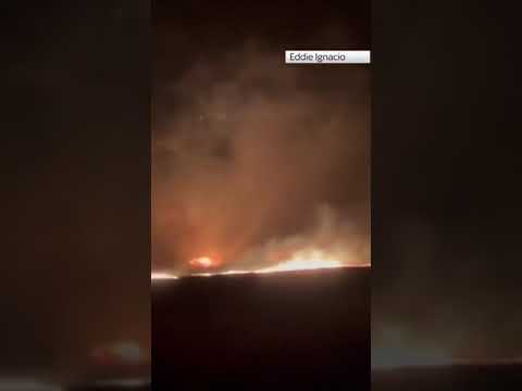 Hawaiians flee fire on boat