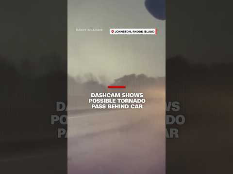 Dashcam shows possible tornado pass behind car