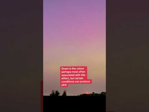 Pink aurora borealis seen over Ottawa