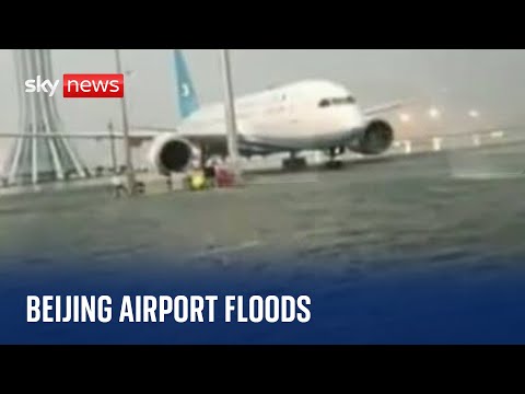 China: Beijing airport floods after Typhoon Doksuri hits capital