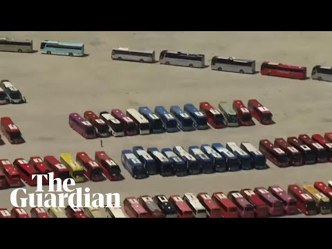 Aerial footage shows hundreds of buses evacuating scouts from South Korea jamboree