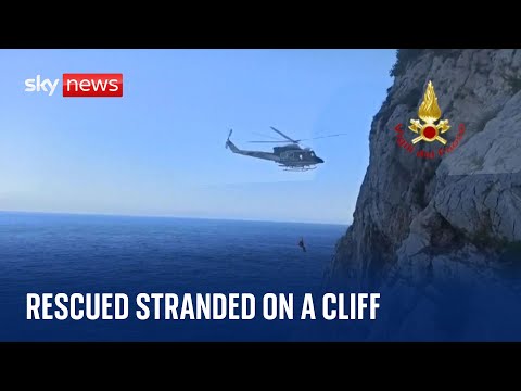 Italy: Helicopter rescues man and two children stranded on cliff in Genoa