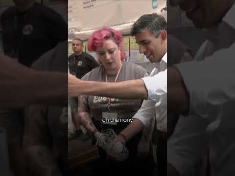 Rishi Sunak heckled while pulling a pint