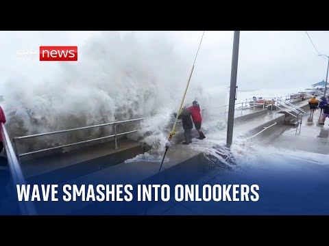 US: Storm surge waves crash into onlookers during Tropical Storm Ophelia