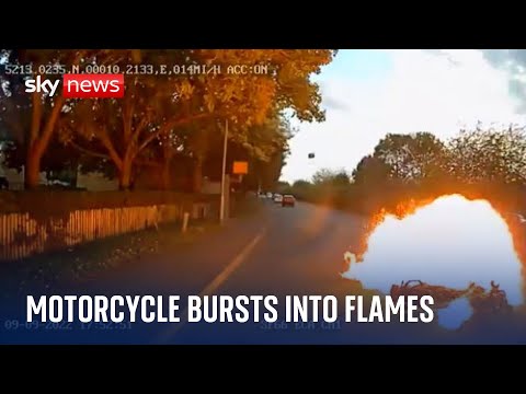 Dashcam footage shows moment motorcyclist crashes into car causing ‘large fireball’
