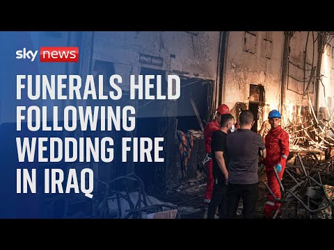 Watch live: Funerals held following wedding fire in Iraq that killed more than 100