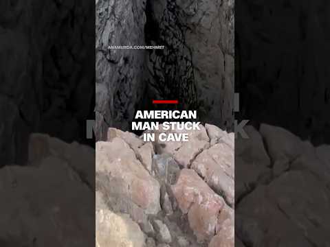 American man stuck in cave
