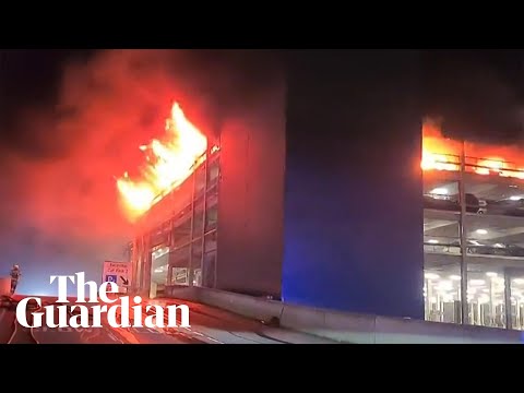 Flames engulf London’s Luton airport multistorey car park