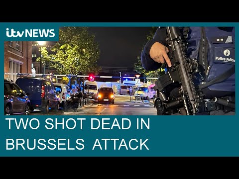 Two shot dead in Brussels terror attack as football fans held in stadium| ITV News