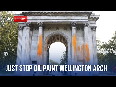 Three arrests after Just Stop Oil protesters spray orange paint on London’s Wellington Arch