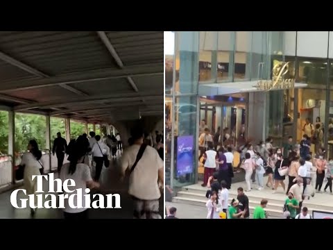 People flee Bangkok shopping mall after three killed in shooting
