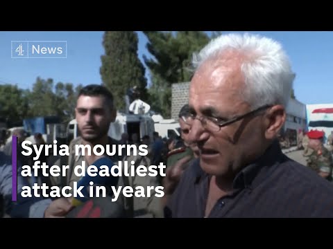 Funerals held in Syria for 100 people killed in one of country’s deadliest attacks in years