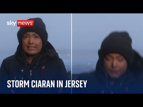 Storm Ciaran: Sky correspondent blown over by strong winds