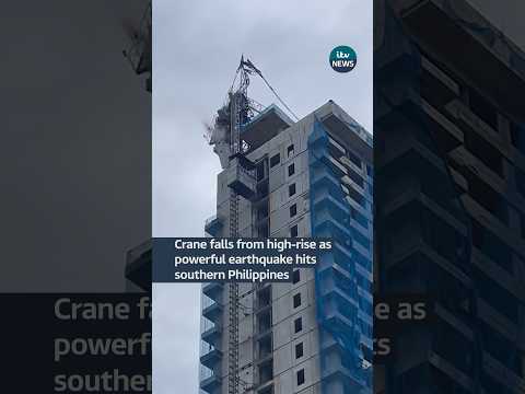 Crane topples from high-rise as powerful earthquake rattles Davao City #itvnews #news #philippines