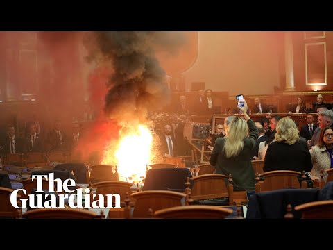 Fire and flares in Albanian parliament after opposition protest