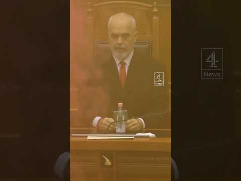 Fire lit in Albania’s parliament by opposition