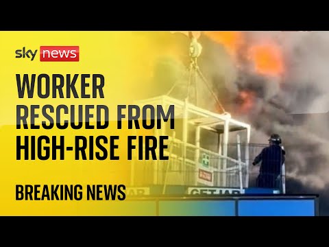 Worker rescued by crane as large fire breaks out at high-rise building in Reading