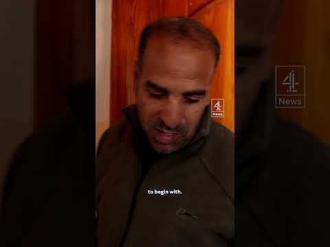 Gazan couple finds missing cat in rubble