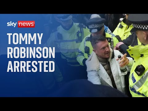 Tommy Robinson arrested at march against antisemitism