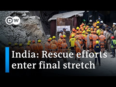 Indian rescuers reach 41 workers trapped in tunnel | DW News
