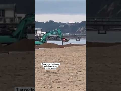 Bournemouth: Driver stuck in sea rescued by colleague’s digger