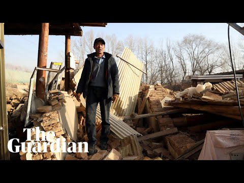 China earthquake survivors go through the rubble in subzero weather
