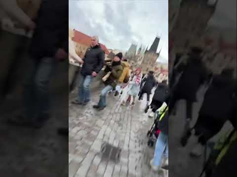People flee during shooting in Prague