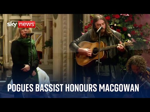 Pogues bassist performs the band’s I’m A Man You Don’t Meet Every Day