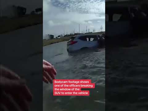 Family rescued from car in freezing water