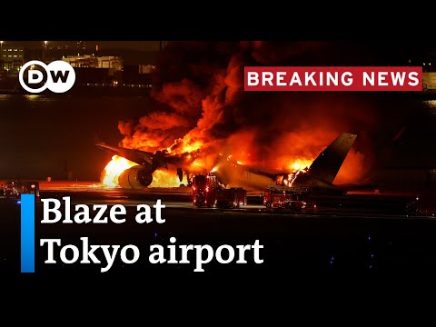 Japan: Passenger plane bursts into flames on runway  | DW News