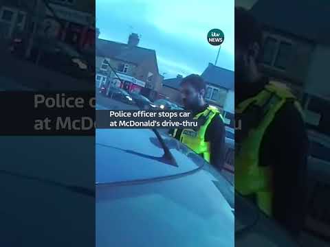 A police officer helped deliver an order after stopping a car at a McDonald’s  #itvnews #mcdonalds