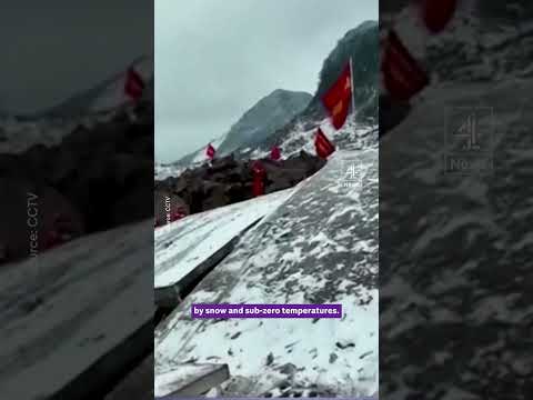 At least 20 dead and dozens missing after China landslide