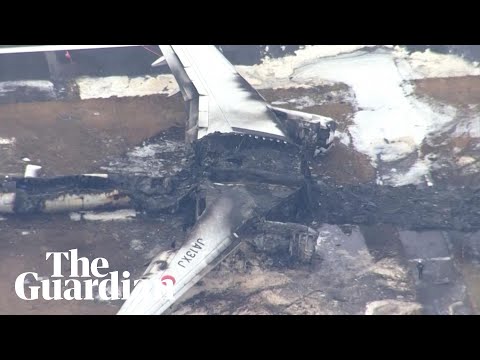 Aerials show plane wreckage after crash at Japan’s Haneda airport