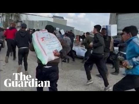 Chaotic scenes during aid distribution in Gaza City as residents flee gunfire