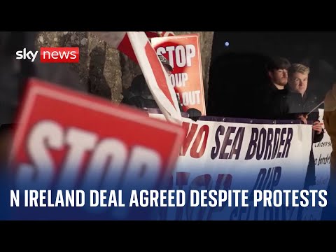 How was power-sharing restored in Northern Ireland?