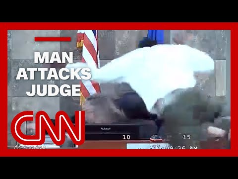 Man jumps bench and attacks judge in court