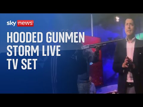 Hooded gunmen burst onto live TV set in Ecuador after drug lord escape triggers state of emergency