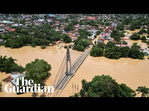 Floods submerge cities in central South America after extreme rainfall