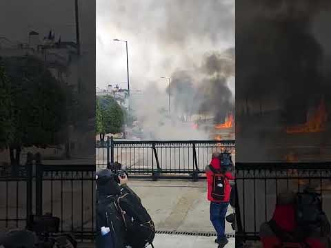 Protests on train crash anniversary turn violent