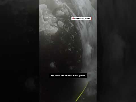 Skier tumbles into hidden waterfall