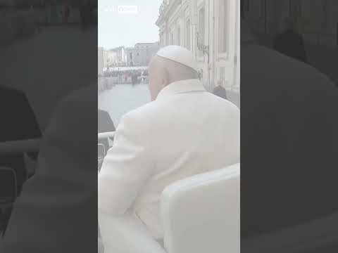 Moment Pope’s hat blows off