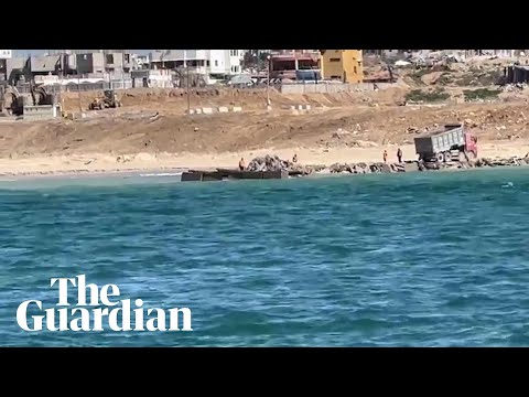 Aid ship from Cyprus begins to offload humanitarian supplies on Gaza coast