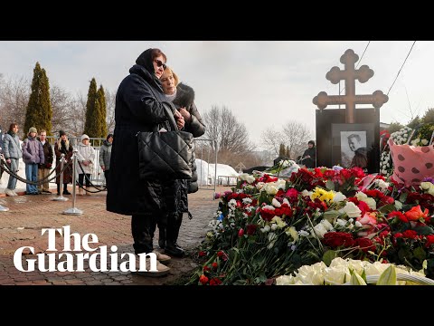 Alexei Navalny’s mother visits his grave in Moscow