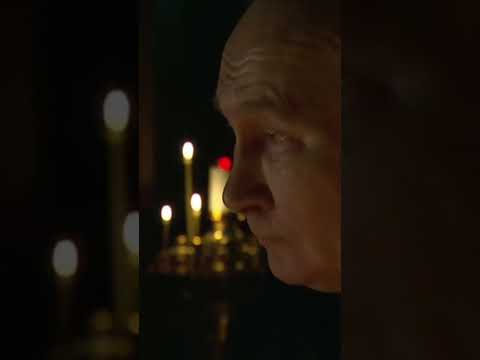 Emotional Putin lights candle after Moscow attack